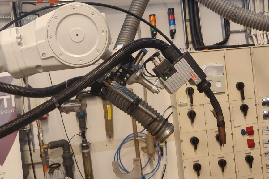 Wire Arc Additive Manufacturing: welding torch mounted on ABB robot