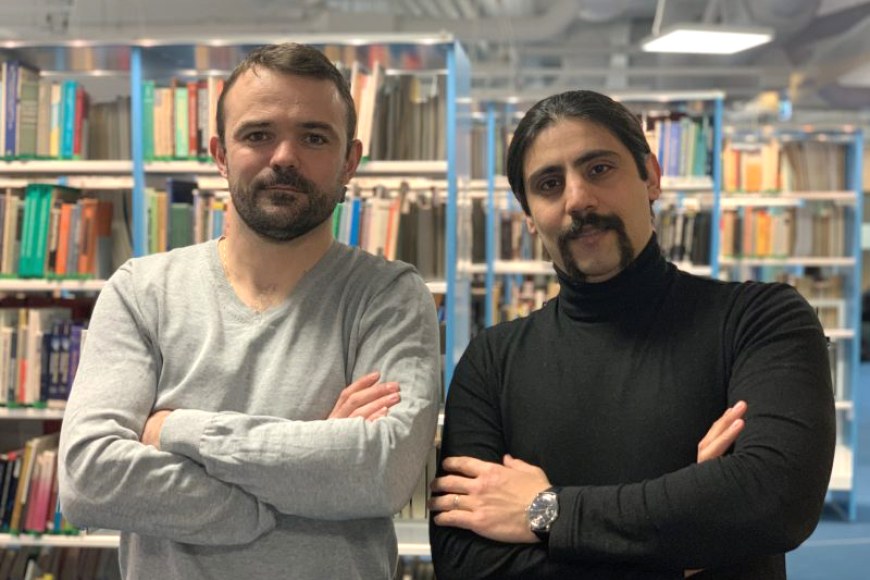 Researchers posing at faculty's library. Photo: Hossain Mokhatarian