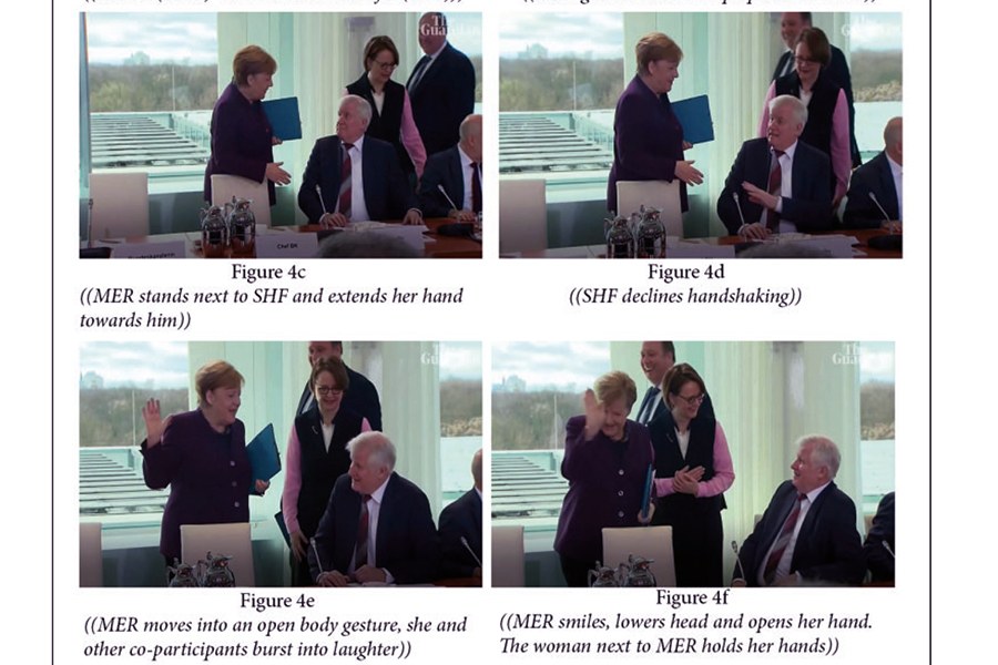 Merkel kättelee