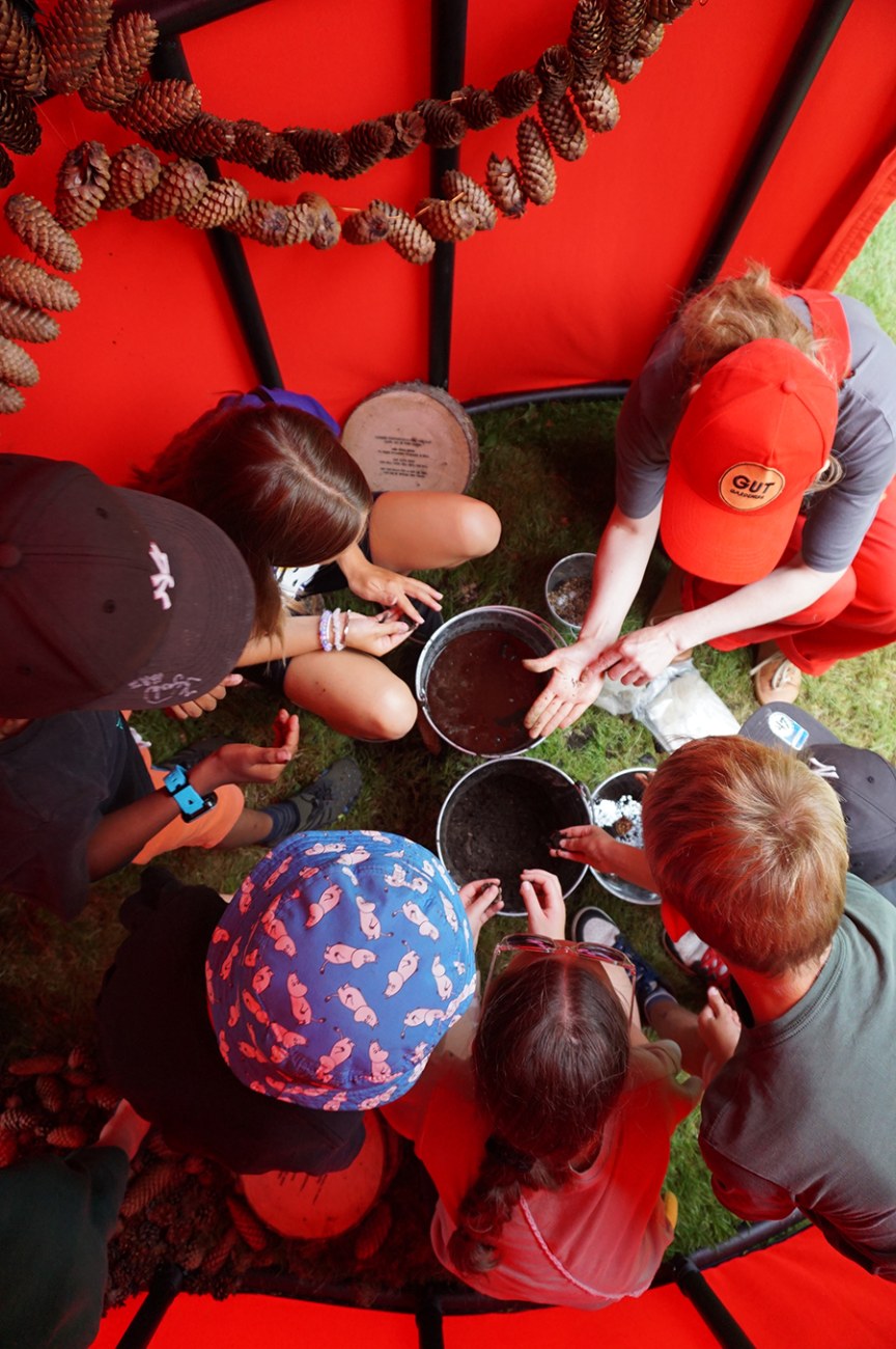 Children making seed balls.