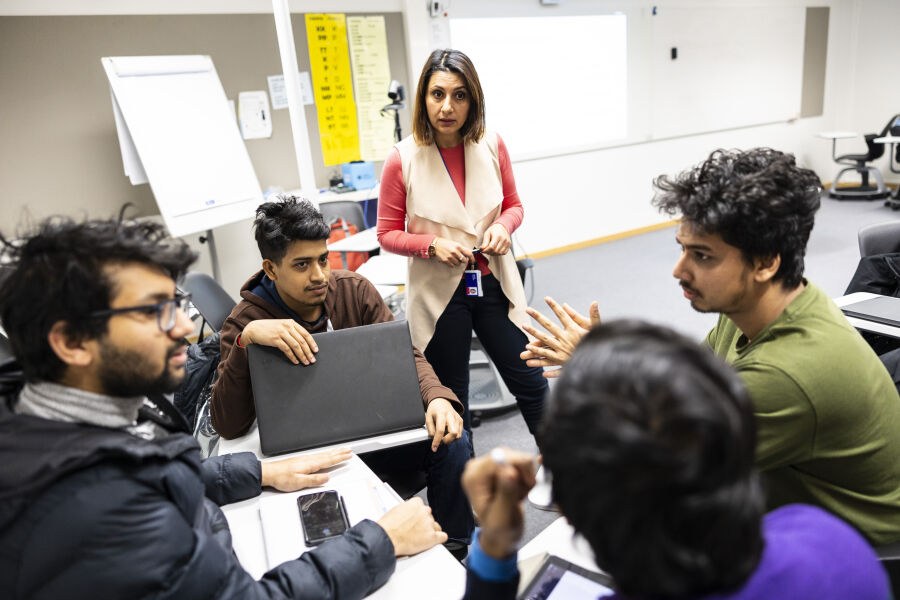Teaching at the language centre. A group work session led by the teacher.