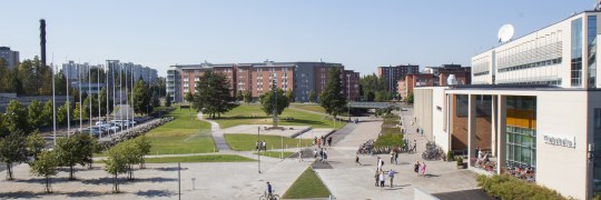 Hervanta campus is a horseshoe shaped with green lawn area in the middle.