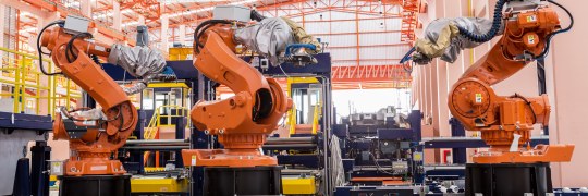 Teollisuusrobotiikka ja tuotantotalous robotit.