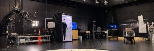 Laboratory of immersive technologies showing virtual reality glasses and virtual reality treadmill, cameras and camera platforms